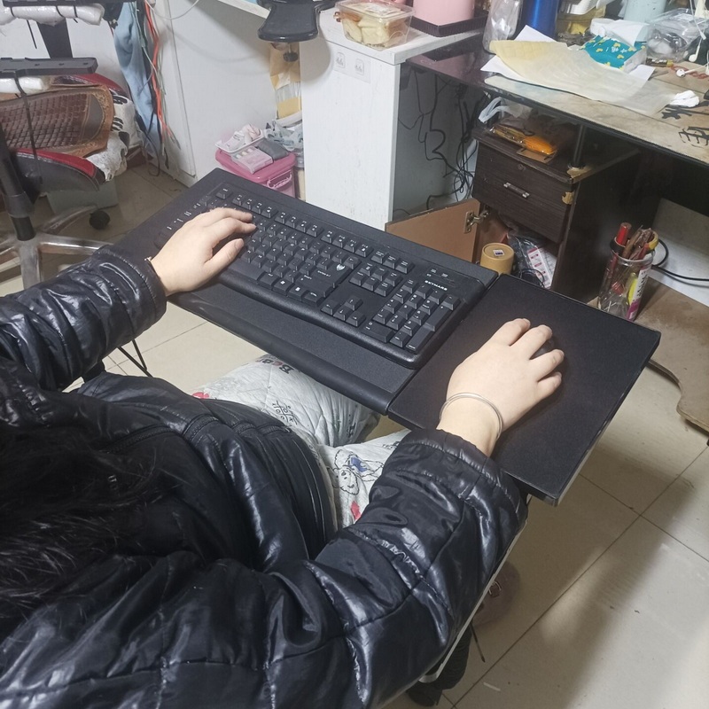 Lying down in the Office, Using a Computer Chair, Keyboard Tray, and Mouse Pad Support to Alleviate Long-Term Sitting and Back Pain Issues Lying down in the Office, Using a Computer Chair, Keyboard Tray, and Mouse Pad Support to Alleviate Long-Term Sitting and Back Pain Issues