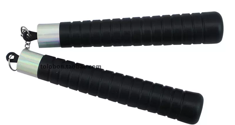 Đồ chơi ngày của trẻ em Nunchaku Vũ khí nhựa Đạo cụ Trang trí biểu diễn Bài tập biểu diễn Nunchaku Two - Sản phẩm Đảng / Magic / Hiệu suất