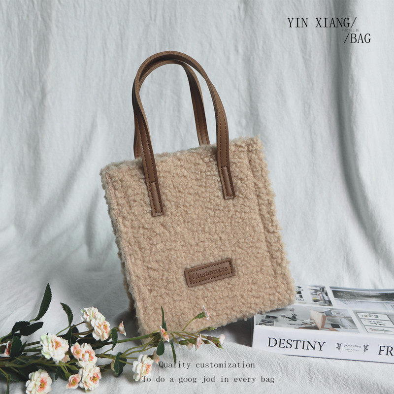 Impression small crowddesign 2020 autumn Winter Korean version ins and lamb hair handbag Mini single shoulder inclined cross hair small bag