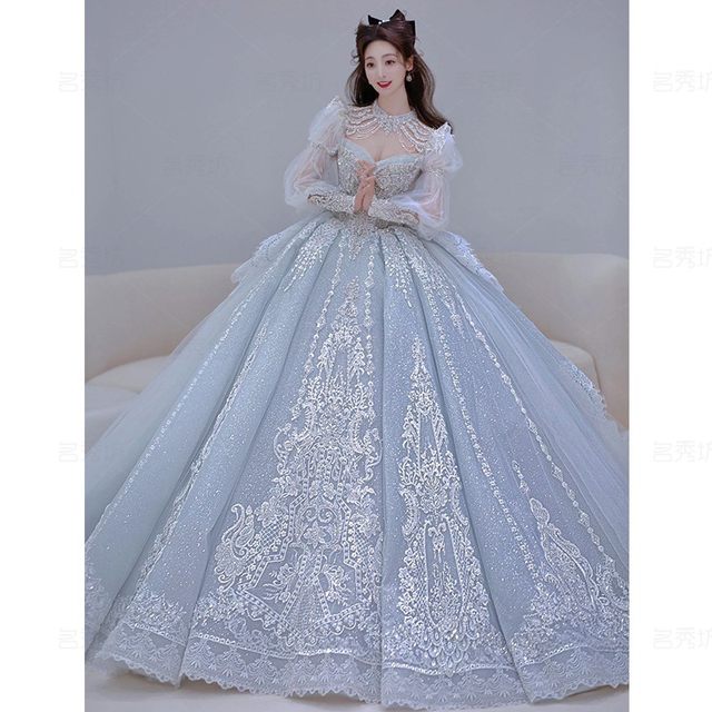 Long-sleeved main wedding dress 2023 new bride tail small 2024 heavy industry starry sky palace style winter ice blue