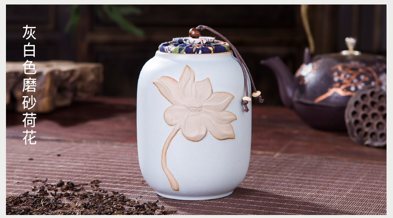 Jingdezhen embossed lotus checking ceramic tea caddy fixings warehouse sealed barrels of pu 'er tea to wake two POTS of cloth cover 4