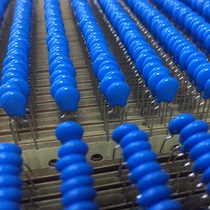 High pressure porcelain sheet capacitive porcelain dielectric capacity 47PF 1KV woven belt row with in-line plug-in blue 5MM foot distance