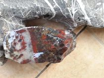 Guilin chicken blood jade exquisite natural jade raw stone with bright red black background 105kg