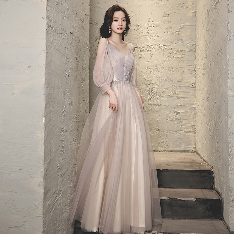 High-end evening gown 2022 new banquet Temperament Famous champagne Light Extravagant Harnesses Long Sleeves Annual Meeting Gown Skirt