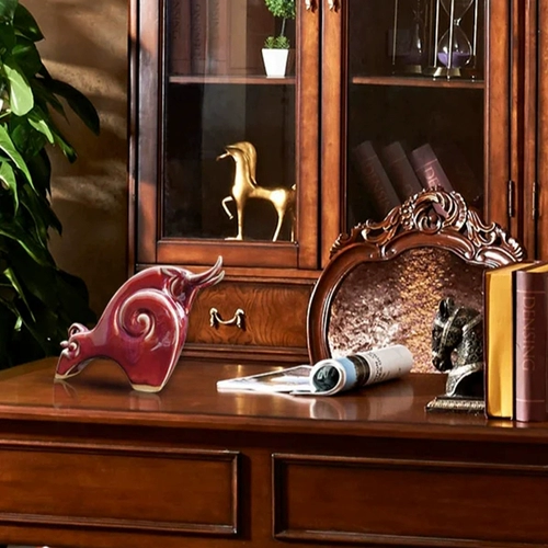 Быки и небо-золото Niu Jun Фарфоровые качание медные красные глазури ремесло