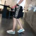 Quần thể thao nam mùa hè xu hướng mới lỏng năm điểm quần short thanh niên kích thước lớn quần giản dị hoang dã đen trắng