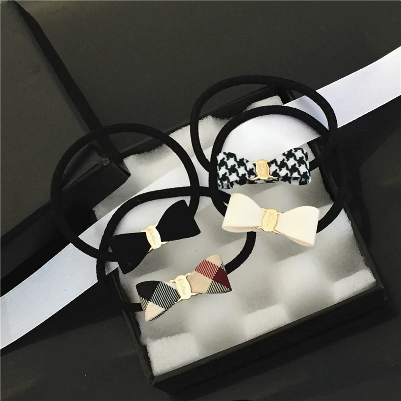 Ban nhạc cao su vòng đeo tay bao da Hàn Quốc kiểm tra vải houndstooth cung đầu dây kèn đơn giản tóc dây tóc phụ kiện tóc - Phụ kiện tóc
