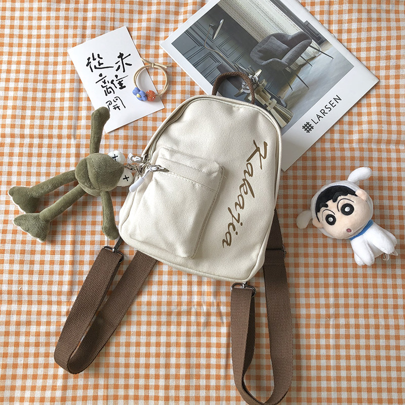 ins Japanese Harajuku lazy sail cloth shoulder bag female 2021 new fashion trend student cartoon doll pendant