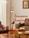 Water Drop Floor Lamp Next to the Sofa in the Living Room, High-End Walnut Color Storage Rack Integrated Side Table, Bedroom Ambient Light