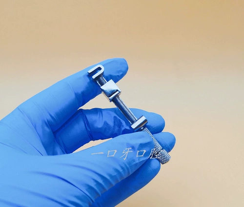 Moom Crainting из нержавеющей стали, образуя таблетку, таблет, таблетка, зажимая зубной материал из нержавеющей стали.