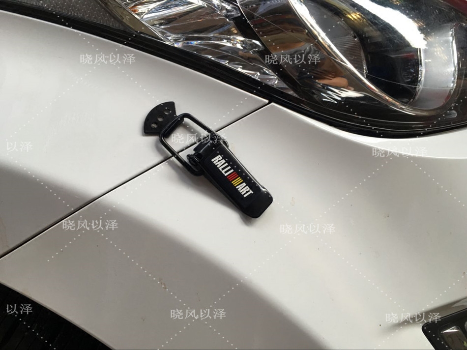 Car hood lock surrounded by decorative hooks modified decorative locks rear trunk hooks surrounded by decorative buckles