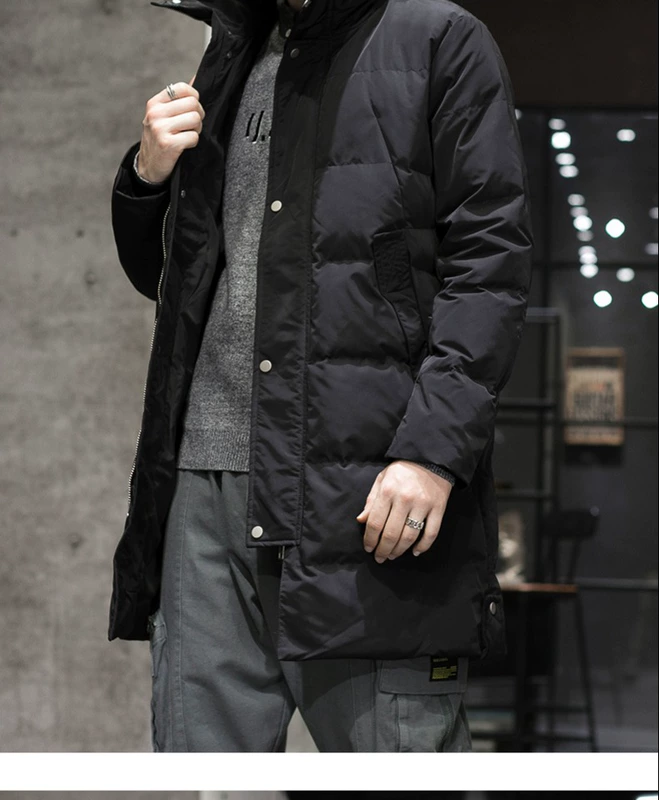 KM nam 2019 mùa đông mới thời trang áo khoác bông cổ đứng dài giữa áo khoác bông thanh niên màu đen ấm áp - Áo vest cotton