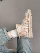 I love the rainbow color scheme. Snow boots.