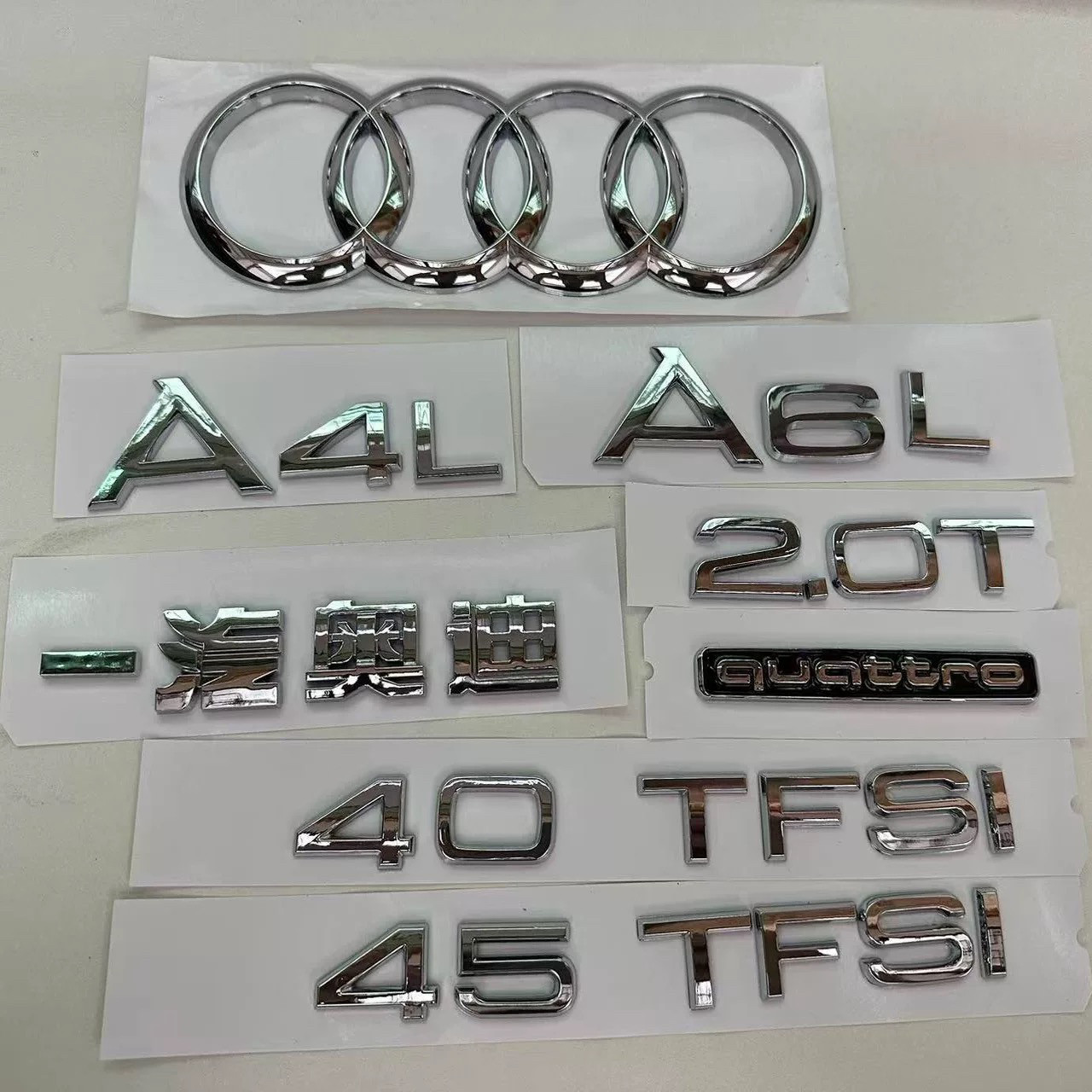 Логотип автомобиля Audi модифицированный объемный логотип A6L на хвостовой части оригинальный логотип A4L сзади наклейка A3Q5Q7Q8 на боковой стороне кузова логотип с полным приводом