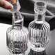 Wine utensils with white wine in one mouthful of stripes and creative artificial blowing