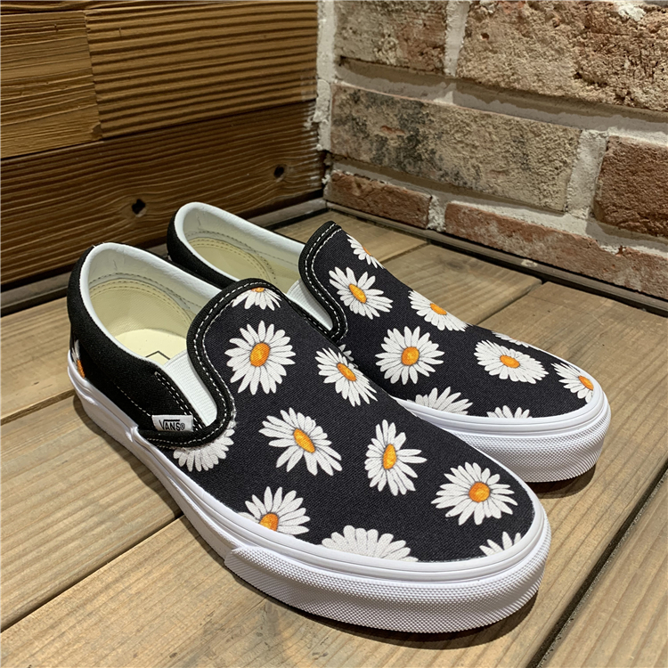 Vans Spot trượt trên những bông cúc nhỏ một chân nam và nữ giày lười rộng Giày vải VN0A38F7TOZ - Plimsolls giầy thể thao