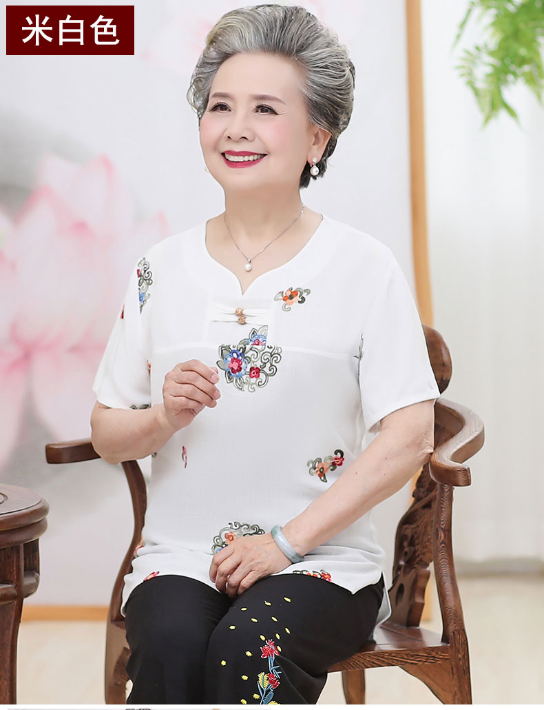 Bà đầm tuổi trung niên mặc váy bà mẹ cổ tròn thêu tay ngắn hai dây quần áo cũ - Quần áo của mẹ áo sơ mi nữ trung niên đẹp
