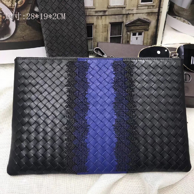 Head skin knitting men's handbag 2022 new European and American fashion youth coloured embroidery handbag