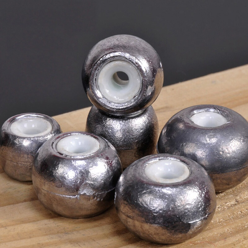 Silver carp and bighead fishing group fixed wind sinker pressure line ceramic core lead sinker ceramic core through-heart sinker sea pole lead sinker anti-tangent lead sinker