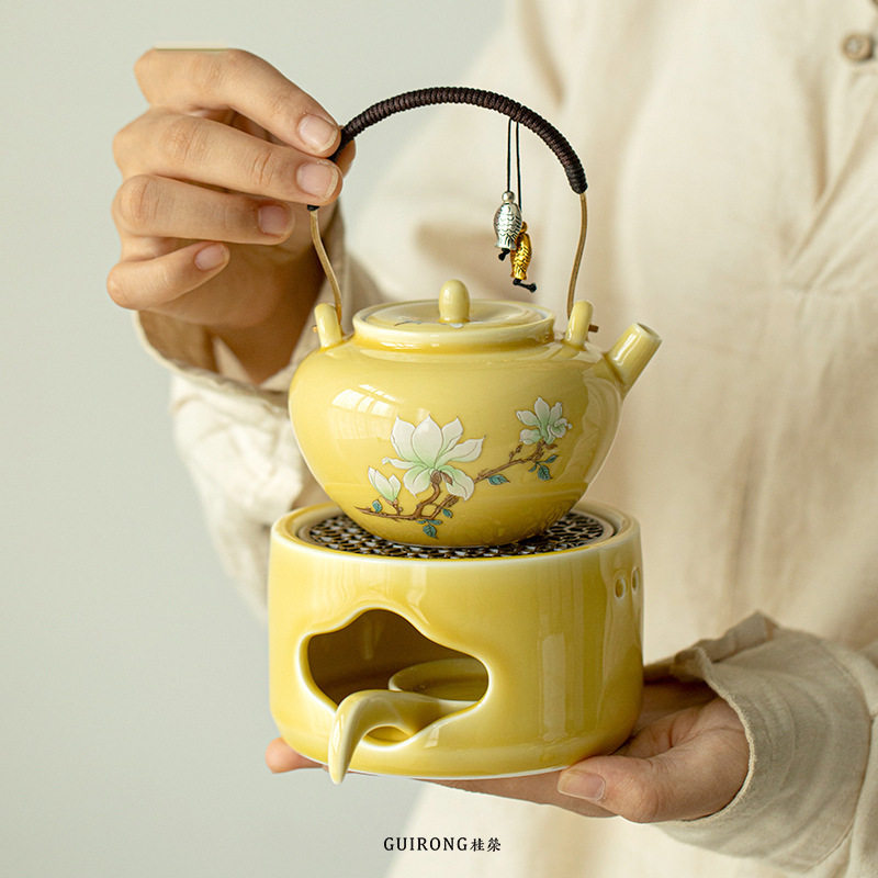 Yao yellow magnolia teapot candle heating tea stove