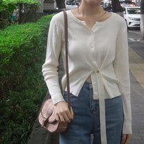 2022 Early autumn new womens clothing small crowdsourced fashion blouse design feeling white round neck long sleeve knit cardigan