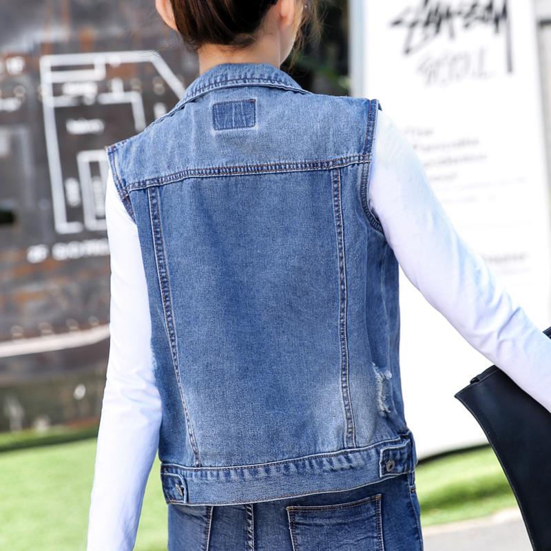 Denim chuồng phụ nữ mùa xuân và mùa thu mới phiên bản Hàn Quốc của clip ngựa vest không tay vai cardigan phụ nữ bên ngoài một chiếc áo khoác lông ngắn