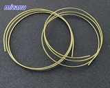 Золотые шелковые нитки, золотое деревянное кольцо, инкрустация камня ручной работы, плетеные аксессуары