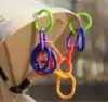 Baby trolley hanging ring Umbrella car hanging buckle Baby rainbow ring Hand grab puzzle environmental protection training ring toy hook