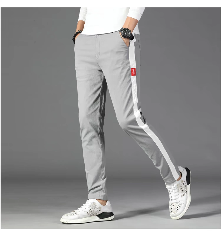 Quần âu hoang dã Quần dài nam cotton mùa thu mới thanh thể thao thoáng khí Slim Hàn Quốc phiên bản quần lọt khe đồ nam
