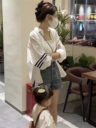 White striped shirt for women autumn 2025 new thin long-sleeved loose slim outer wear sun protection shirt jacket top