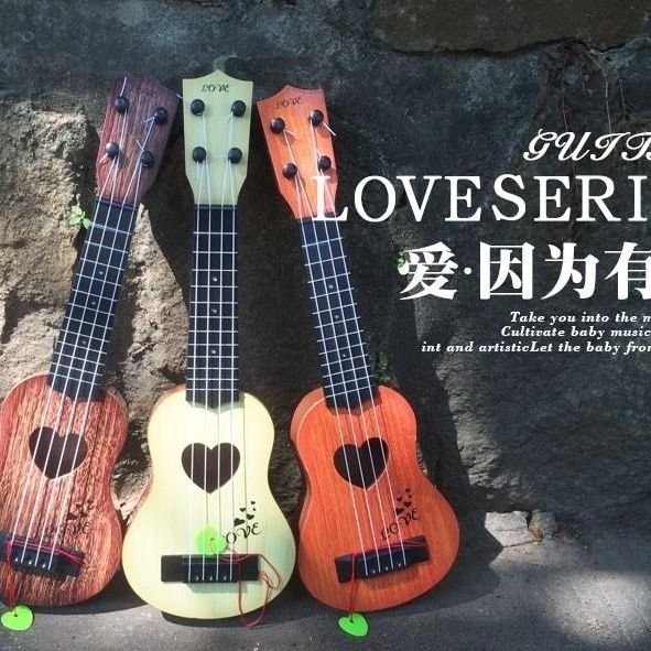 Ukulele dây kim loại cho nam giới và phụ nữ mới bắt đầu trẻ em bài hát dân gian đồ chơi guitar nhỏ có thể chơi để chọn nhạc cụ - Nhạc cụ phương Tây đàn guitar điện