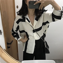 2022 Early spring new irregular long sleeve shirt female Korean version temperament blouse pure desire for elegant retro polo jacket