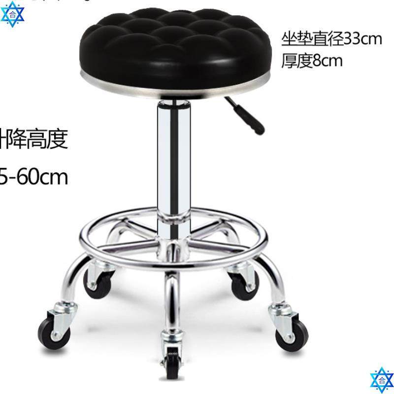 The barber works on a high stool for hair cutting and