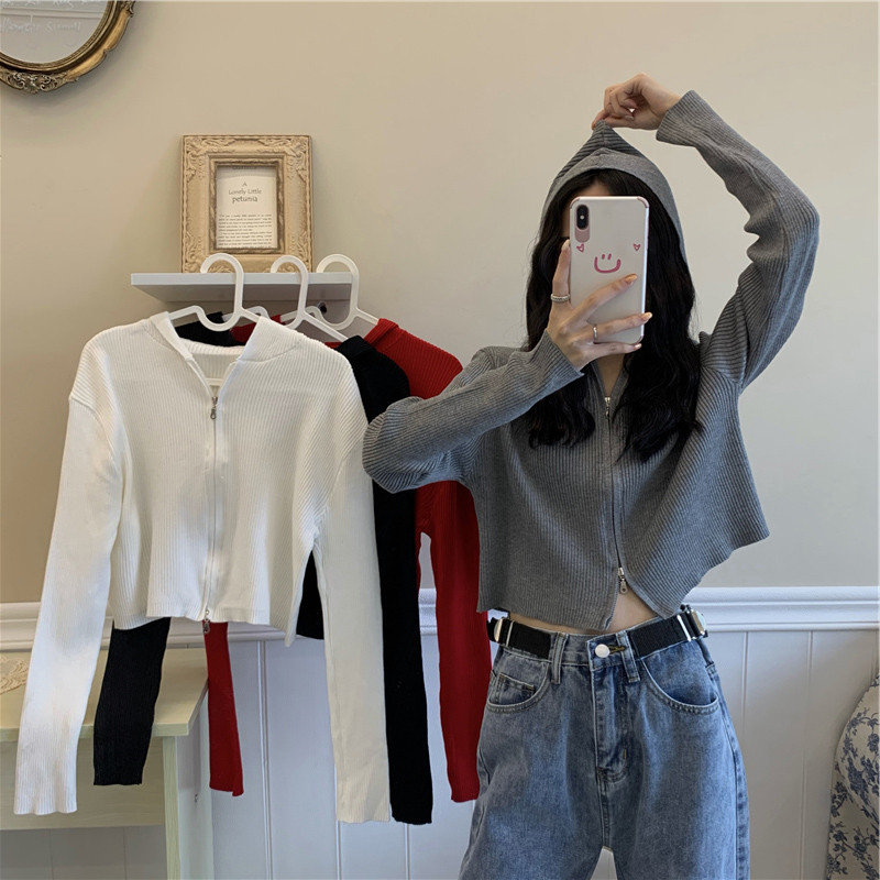 Superfire cec cardiovert knitted woman early autumn Korean version with cap short Dew Navel Coat and Chains Chauded students fix their clothes