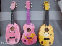 Export Australia original single childrens early education 4 string 6 guitar Ukulele delivery book strap 20 models