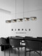Italian Minimalist Restaurant Chandelier Designer 2026 New Model High-End Light Luxury Elegant Long Island Table Dining Table Chandelier