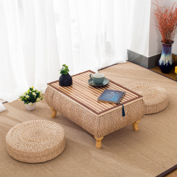 The small table on the bay window, the window sill, the small coffee table, the rattan straw woven floor, the tatami, the coffee table, the kang table