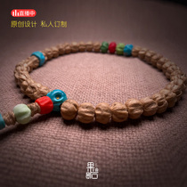 (Guoshi designer) re-carved lotus pile passion seed hand-held twist bead set rapeseed yellow Yueer raw ore