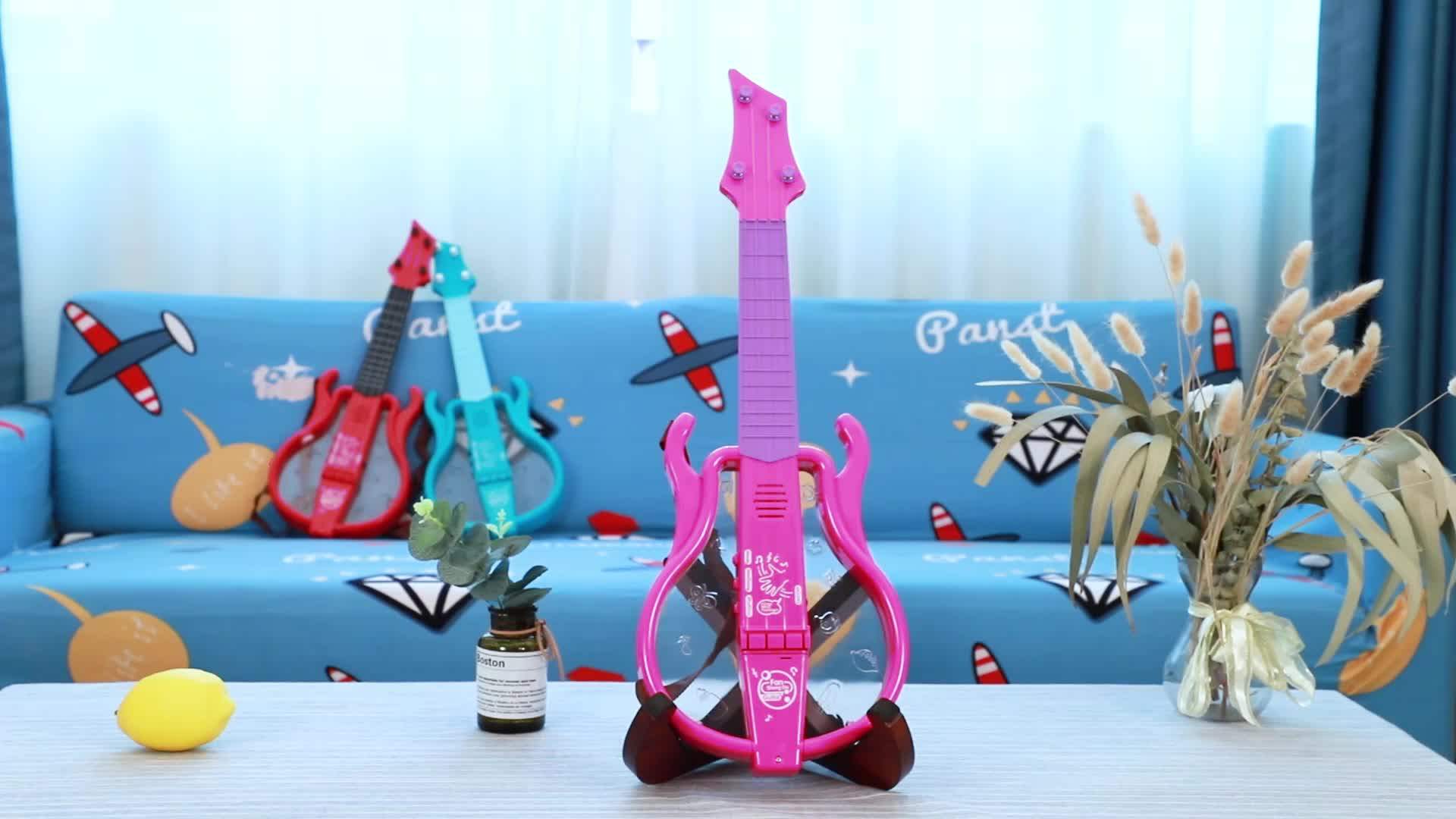 ピンク色のプリンセスおもちゃプラスチックギター楽器