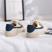 Giày vải mùa xuân nữ 2019 mới retro Hồng Kông hương vị sinh viên hoang dã Phiên bản Hàn Quốc của đôi giày nhỏ màu trắng Hồng Kông - Plimsolls