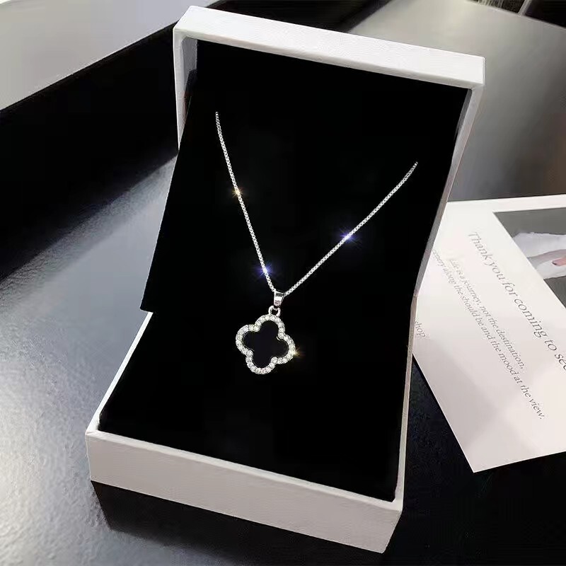 Double-Sided Four-Leaf Clover Silver Titanium Steel Necklace, High-End Light Luxury Niche Design Clavicle Chain, 2026 New Model Neck Chain Double-Sided Four-Leaf Clover Silver Titanium Steel Necklace, High-End Light Luxury Niche Design Clavicle Chain, 2026 New Model Neck Chain