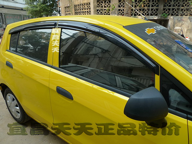 Double Crown Chevrolet new sail hatchback sun visor Mô hình không giới hạn với các rãnh dày hatchback chuyên dụng miếng dán chống nước cho gương ô tô