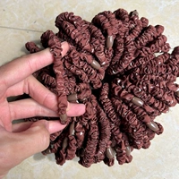 Имеется около 100 кружков тонкой кишки со смайликом и коричневым цветом.