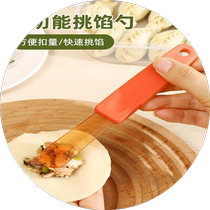 Dumpling filling spoon shoveling spoon stuffing stirring wonton hand scooping spoon making dumplings making buns picking chaos artifact