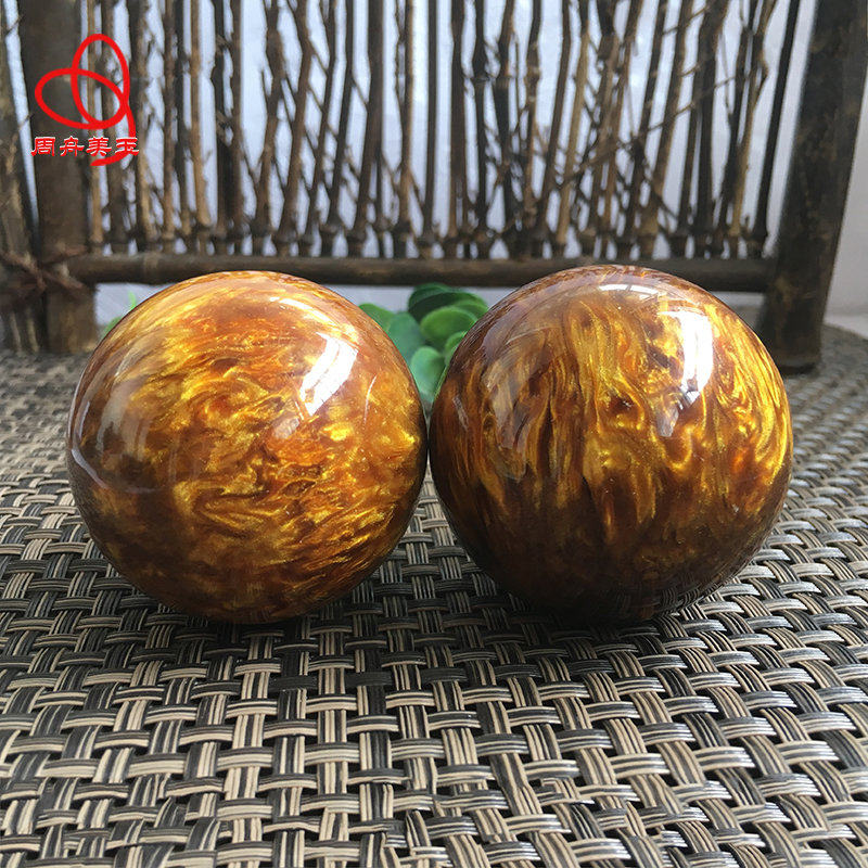 Golden silk sea willow handball black coral jade hand piece health care ball yak collection old material blood Liuwen play men and women