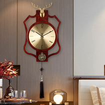 New Chinese style classical wooden wall clock Living room Zen stone clock Fashion deer head gas silent clock Chinese style hanging watch