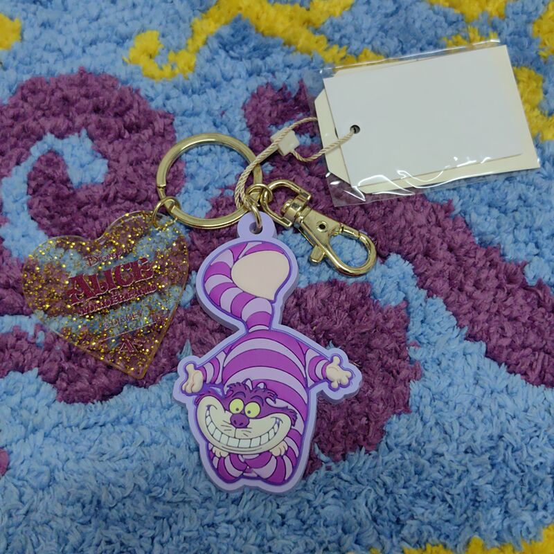 Accommodore Japan Disney Alice Cheshire Cat Keychain Brand New with Tag, in Stock Accommodore Japan Disney Alice Cheshire Cat Keychain Brand New with Tag, in Stock