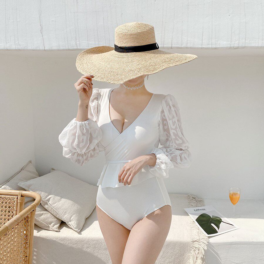 The new slim long-sleeved fairy fan puff sleeve big lady style pure desire one-piece swimsuit female beach bikini