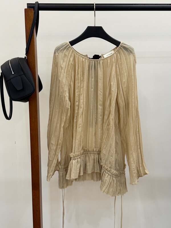The Raaare French-Style Lyocell Ruffled Blouse with Adjustable Drawstring Hem and Back Tie Shirt