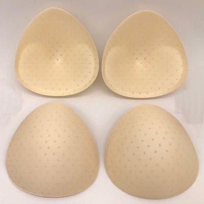 Triangular breathable sponge chest pads for sports underwear, detachable perforated thickened inserts for fitness bras, and converging cup covers